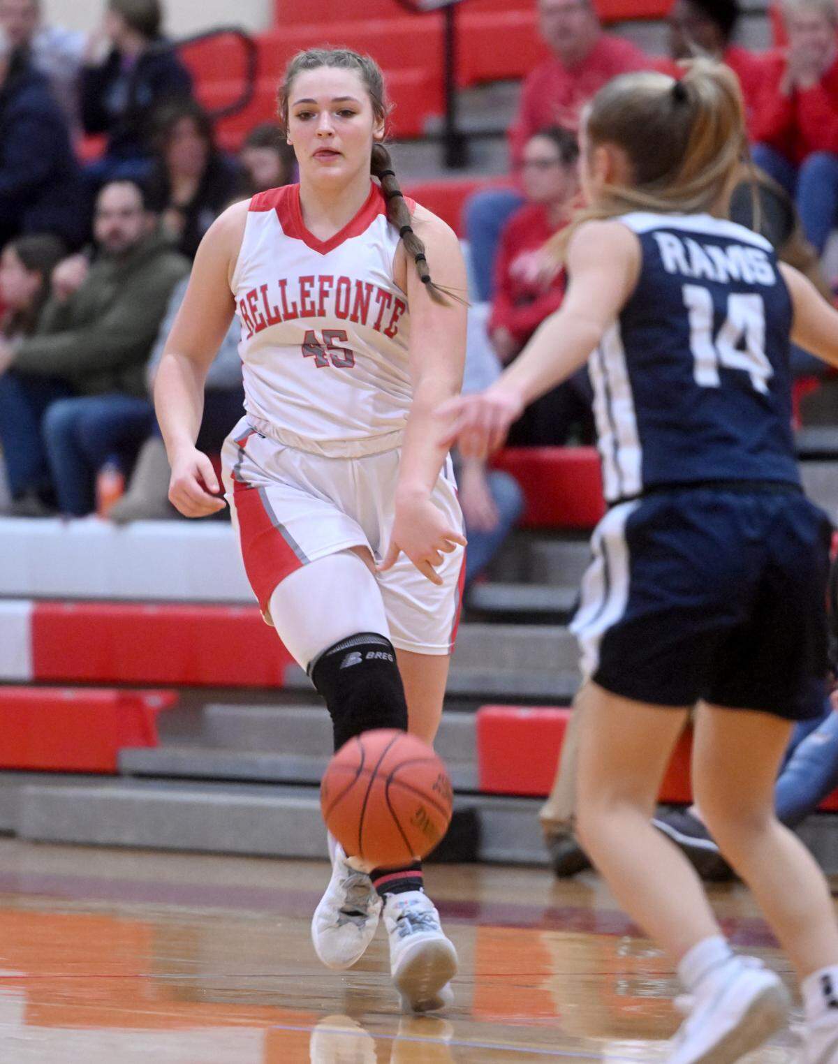 Bellefonte’s Taylor Brown dribbles down the court with the ball around a Penns Valley defender during the game on Monday, Jan. 23, 2023.
