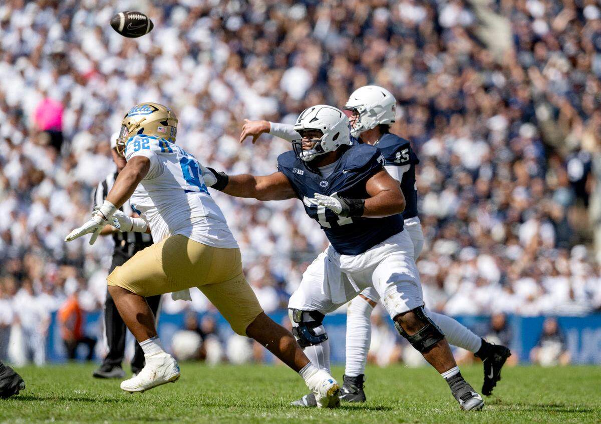 Penn State offensive lineman Vega Ioane blocks a UCLA defender during the game on Saturday, Oct. 5, 2024 at Beaver Stadium.