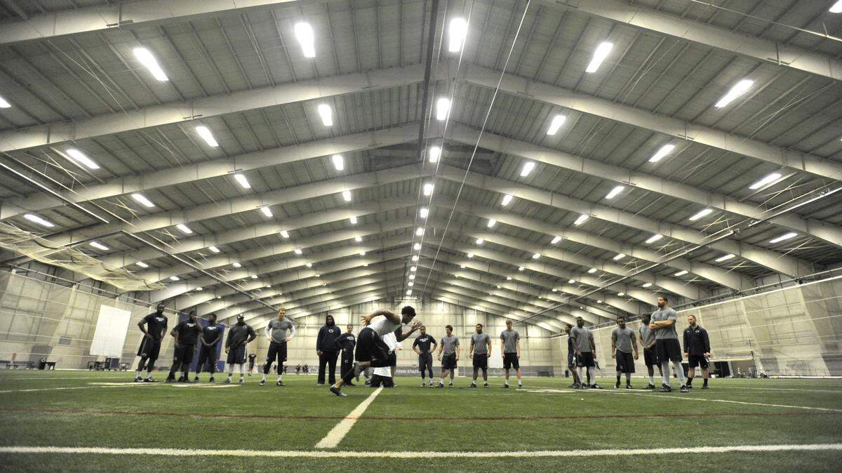 Former Penn State safety Marcus Allen sprints in the shuttle run. at Holuba Hall. The indoor facility is just one of several football-related areas that will be renovated for $69 million; other spots include the Lasch Football Building and the outdoor practice fields.