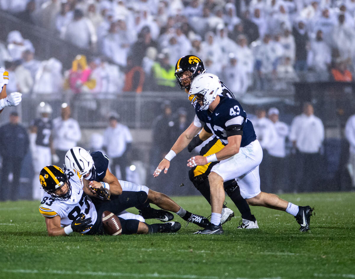 Penn State Linebacker Tyler Elsdon tackles Iowa’s Erick All during the third quarter of Penn State Football’s game against Iowa on Saturday, Sept. 23, 2023, at Beaver Stadium.