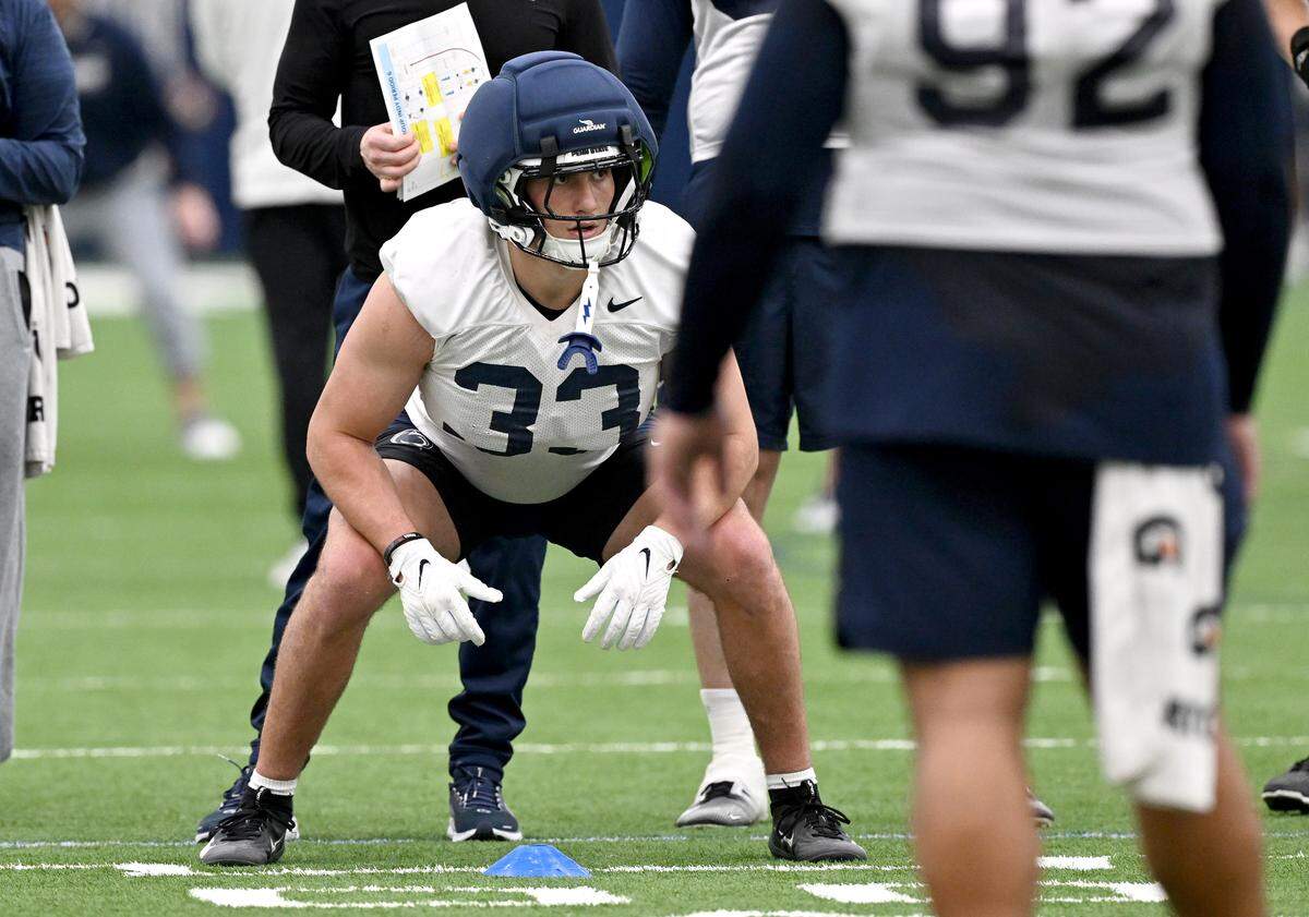 Penn State defensive end Alexander McPherson lines up for a play during spring practice on Thursday, March 26, 2026.  