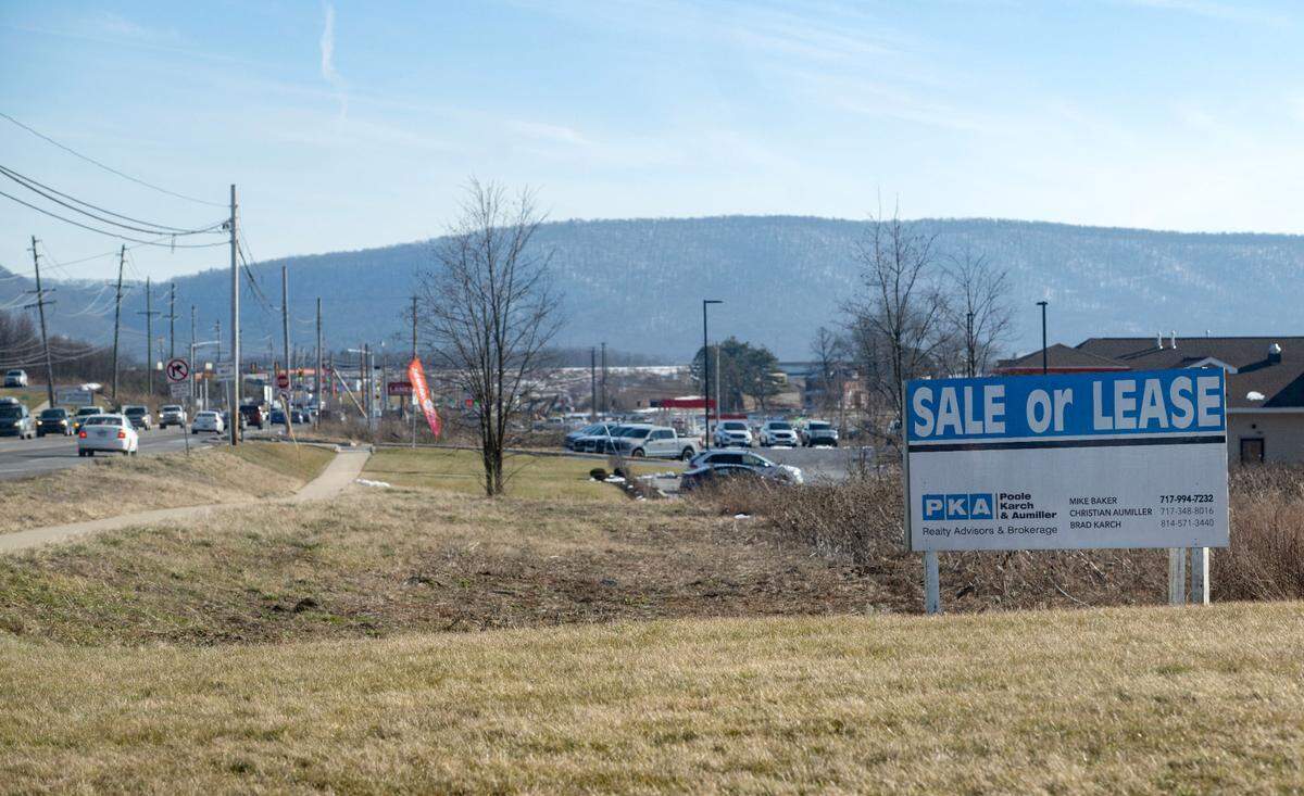 A property for sale along Benner Pike is pictured on Feb. 20. The area has seen a development boom in recent years.