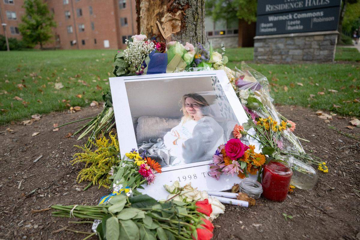 A photograph of Lovisa Arnesson-Cronhamre, 25, of Sweden, surrounded by flowers near the spot on Park Avenue where she was hit by a car driven by Ahmed Alqubaisi.
