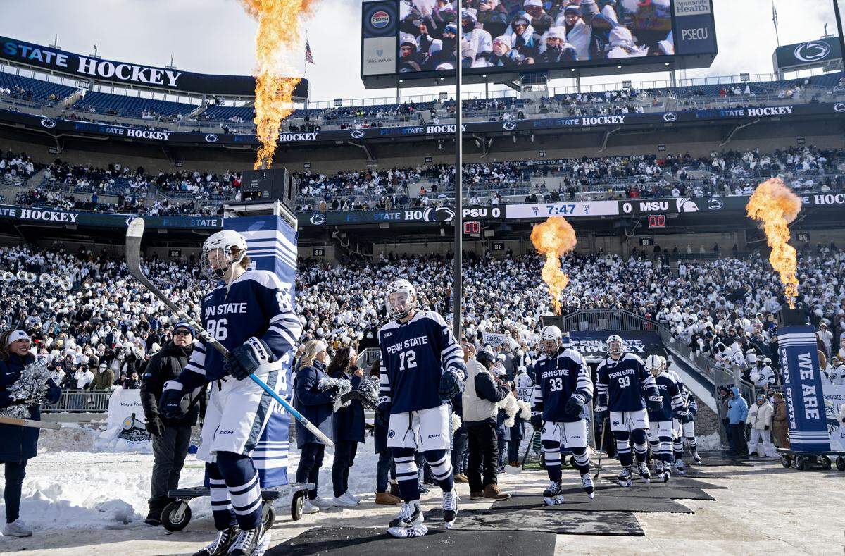 The Penn State men’s hockey team walks into Beaver Stadium for their the game against Michigan State at Beaver Stadium on Saturday, Jan. 31, 2026.