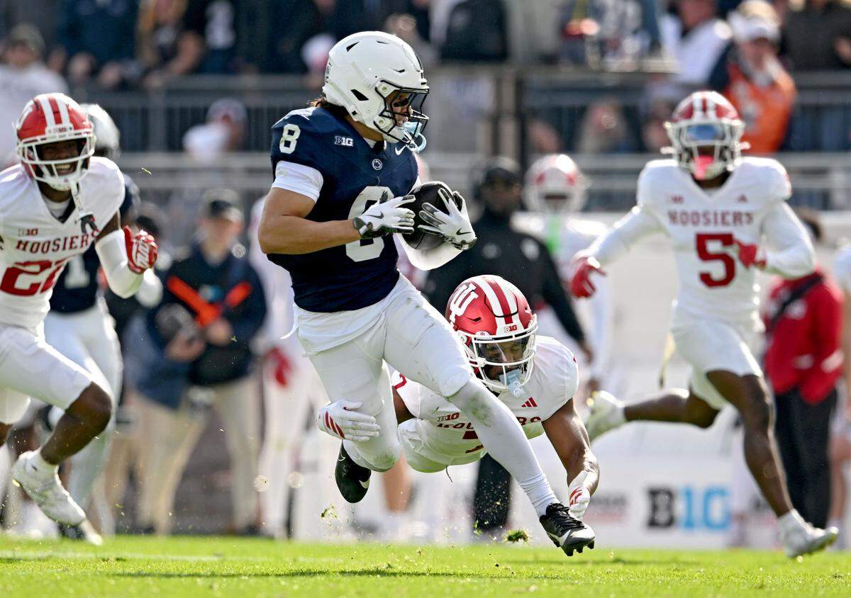 Indiana defensive back Louis Moore dives to stop Penn State wide receiver Trebor Peña during the game on Saturday, Nov. 8, 2025.