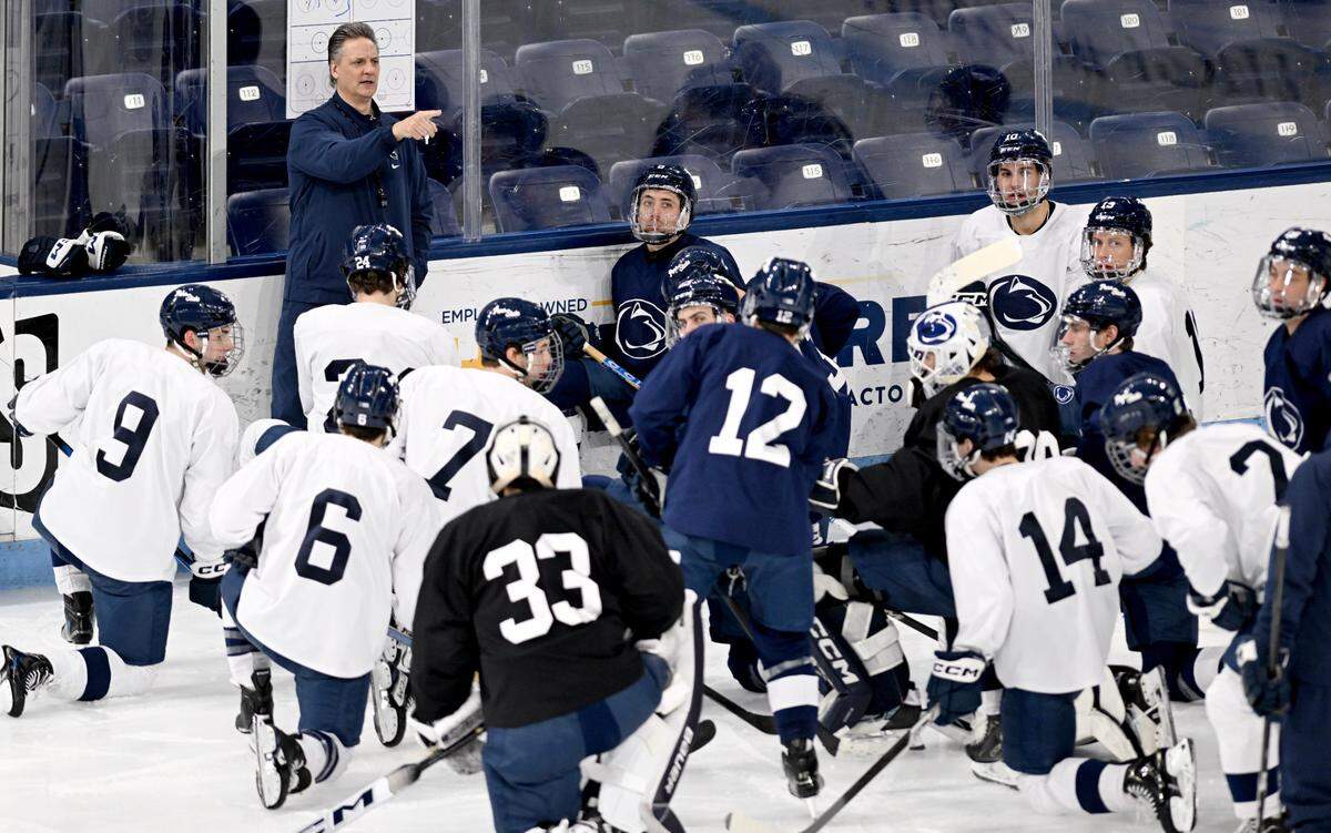 Penn State hockey coach Guy Gadowsky talks to his players during practice on Monday, April 7, 2025 at Pegula Ice Arena.