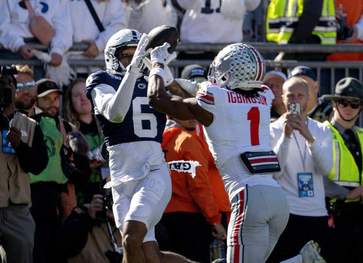 Ohio State’s Davison Igbinosun defends Penn State wide receiver Tre Wallace as he tries to make a catch in the endzone during the game on Saturday, Nov. 2, 2024 at Beaver Stadium.
