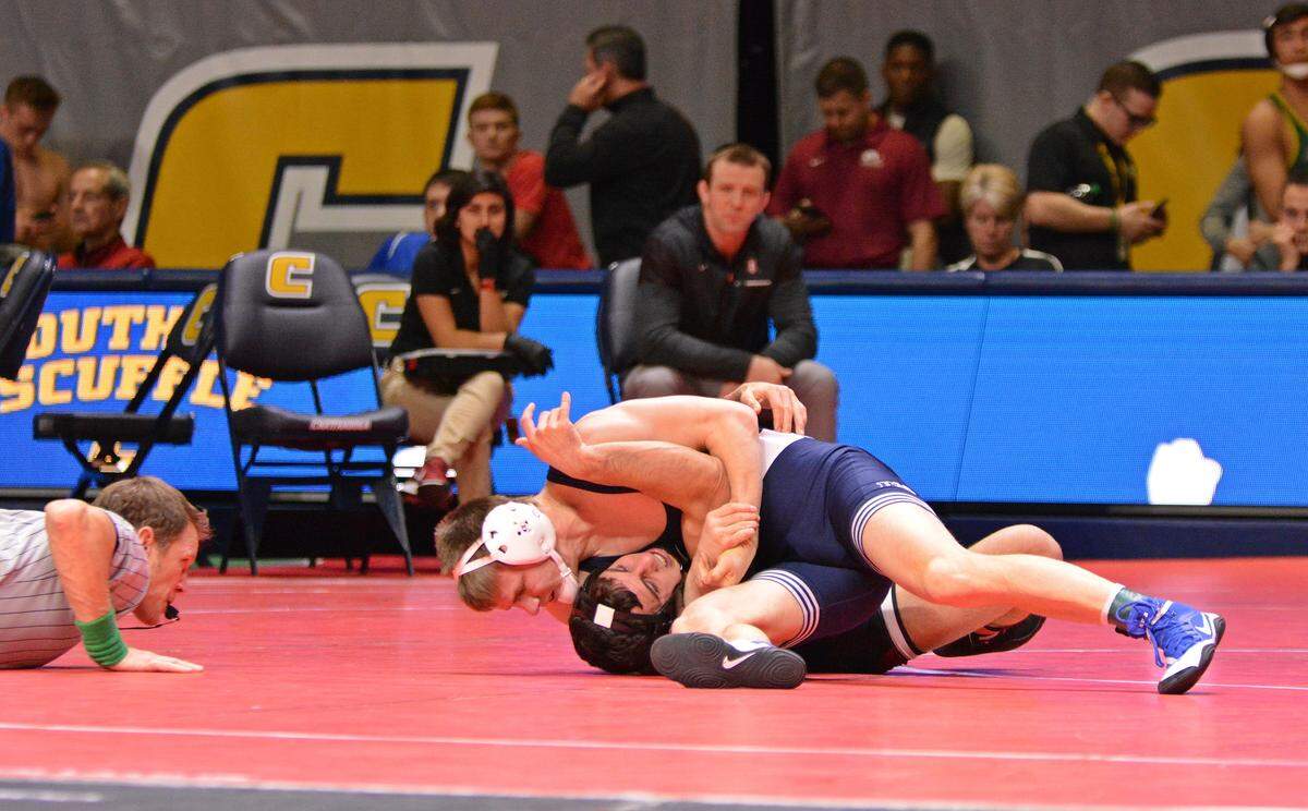 Penn State’s Jason Nolf looks for the pin of Stanford’s Jared Hill in their 157-pound second round match of the Southern Scuffle on Tuesday in Chattanooga, Tenn. Nolf did pin Hill in 1:21 and later tied the all-time pin mark with his 52nd pin in the third round.