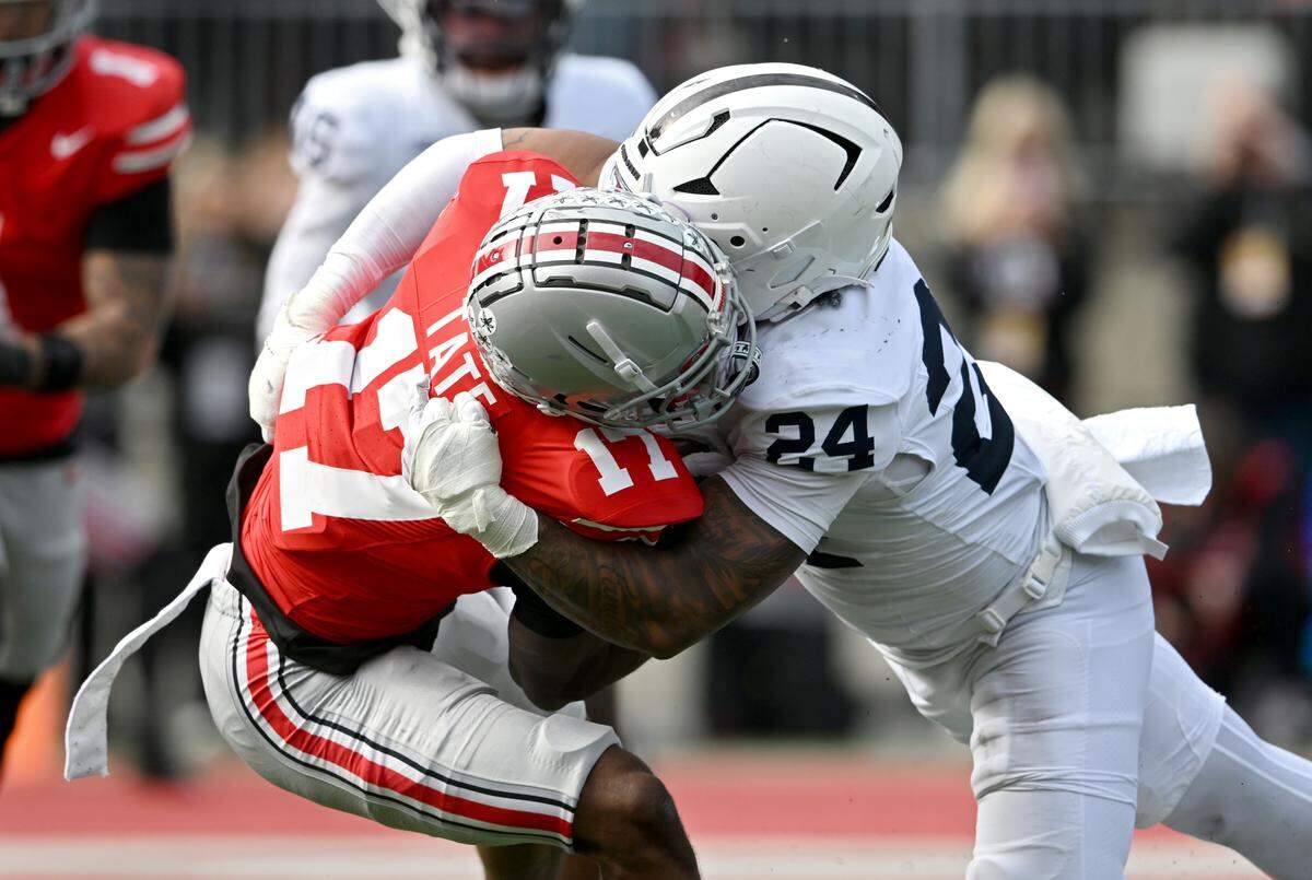 Penn State linebacker Amare Campbell stops Ohio State wide receiver Carnell Tate during the game on Saturday, Nov. 1, 2025. 