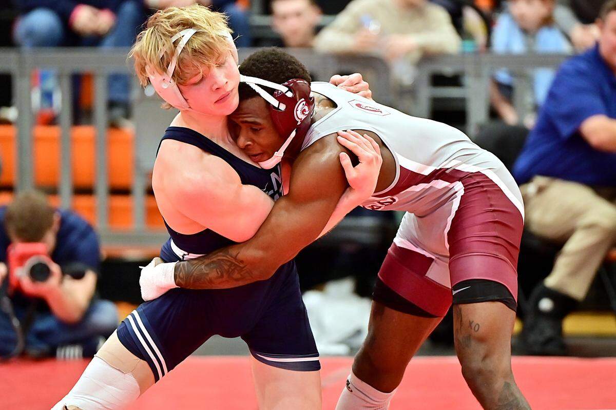 Penn State’s Braeden Davis attempts to fight off a takedown attempt from Little Rock’s Nasir Bailey in their 133-pound bout of the Nittany Lions’ 44-0 win on Sunday.