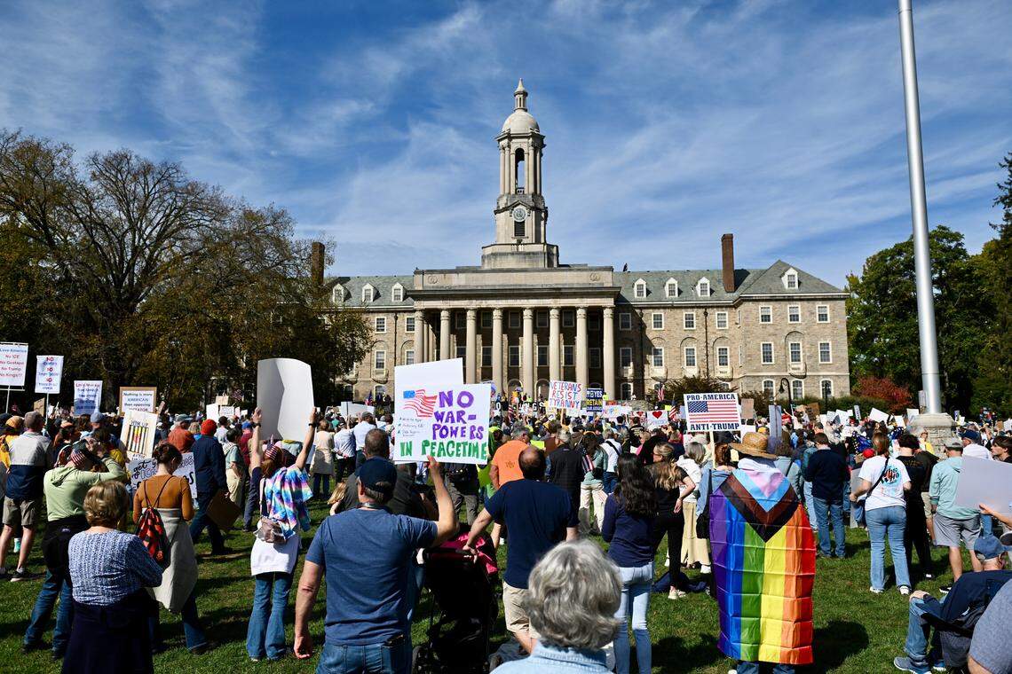 More than 1,500 protesters gather on Penn State’s Old Main lawn on Saturday, Oct. 18, 2025, for a “No Kings” anti-Trump rally.