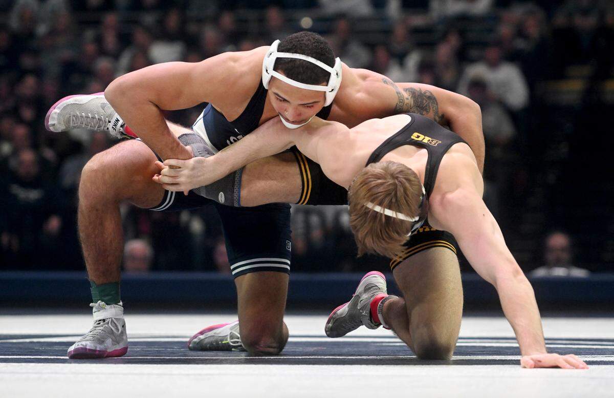 Penn State’s Aaron Brooks controls Iowa’s Drake Rhodes in the 184 lb bout of the match on Friday, Jan. 27, 2023. Brooks won by tech fall at the Bryce Jordan Center.