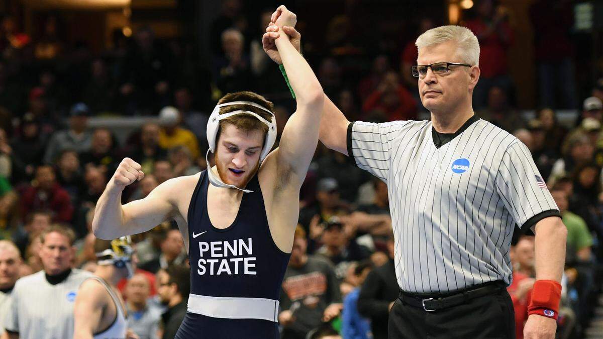 Penn State’s Nick Lee reacts to his victory over North Carolina State’s Kevin Jack to place fifth at 141 pounds at the NCAA Division I Wrestling Championships Saturday, March, 17, 2018 at the Quicken Loans Arena in Cleveland, Ohio.