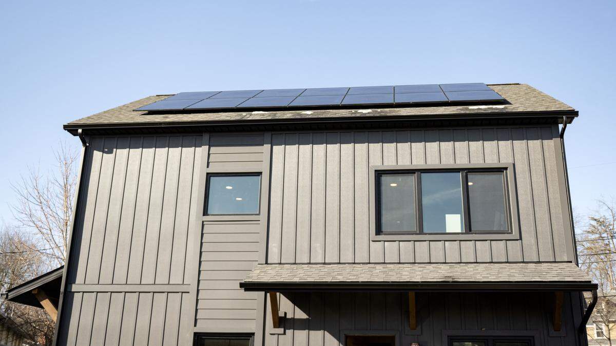 Solar panels are pictured on the roof of the newly built Old Boalsburg Road Flats in December. 