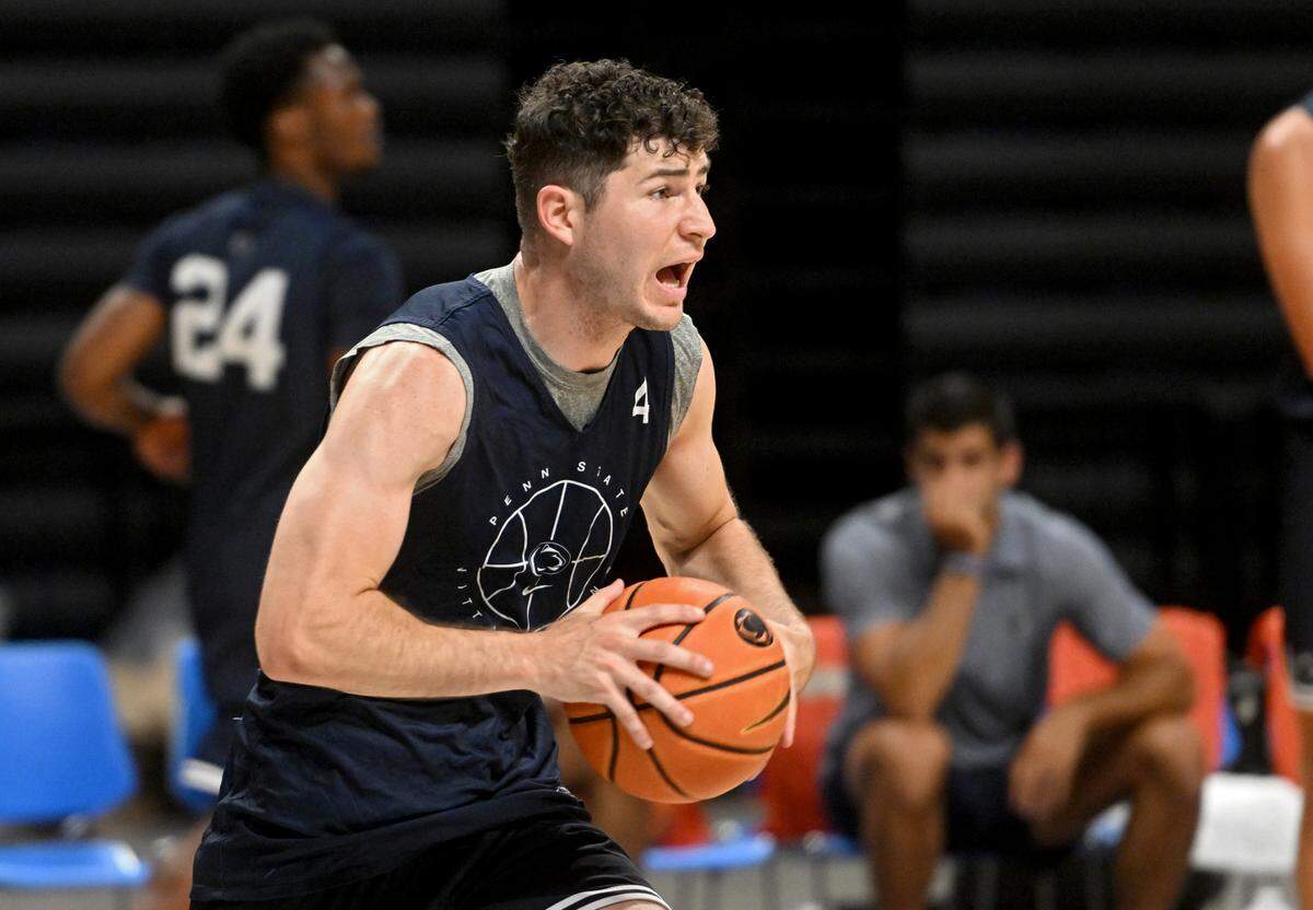Penn State’s Andrew Funk yells to a teammate as they run a drill during summer practice on Tuesday, July 19, 2022.