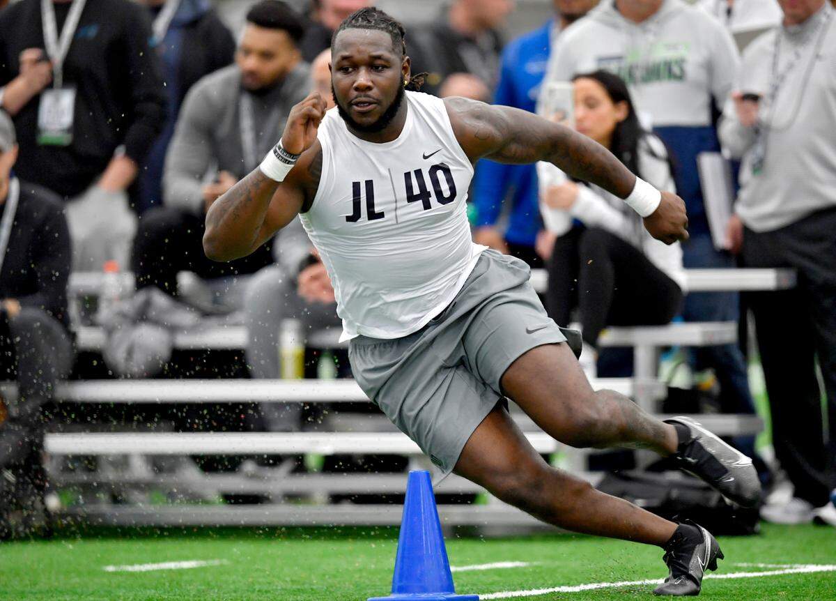 Linebacker Jesse Luketa runs the pro shuttle during Penn State pro day on Thursday, March 24, 2022.