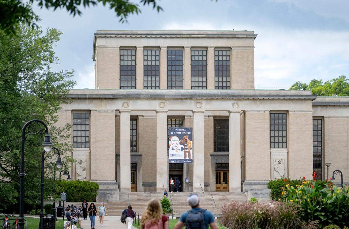 Students walk to the Pattee and Paterno Library on the Penn State campus on Monday, Sept. 12, 2022.