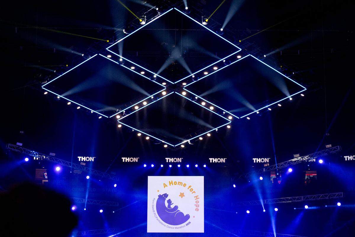 Lights in the shape of a diamond over the 2025 Penn State Thon logo on Friday, Feb. 21, 2025.