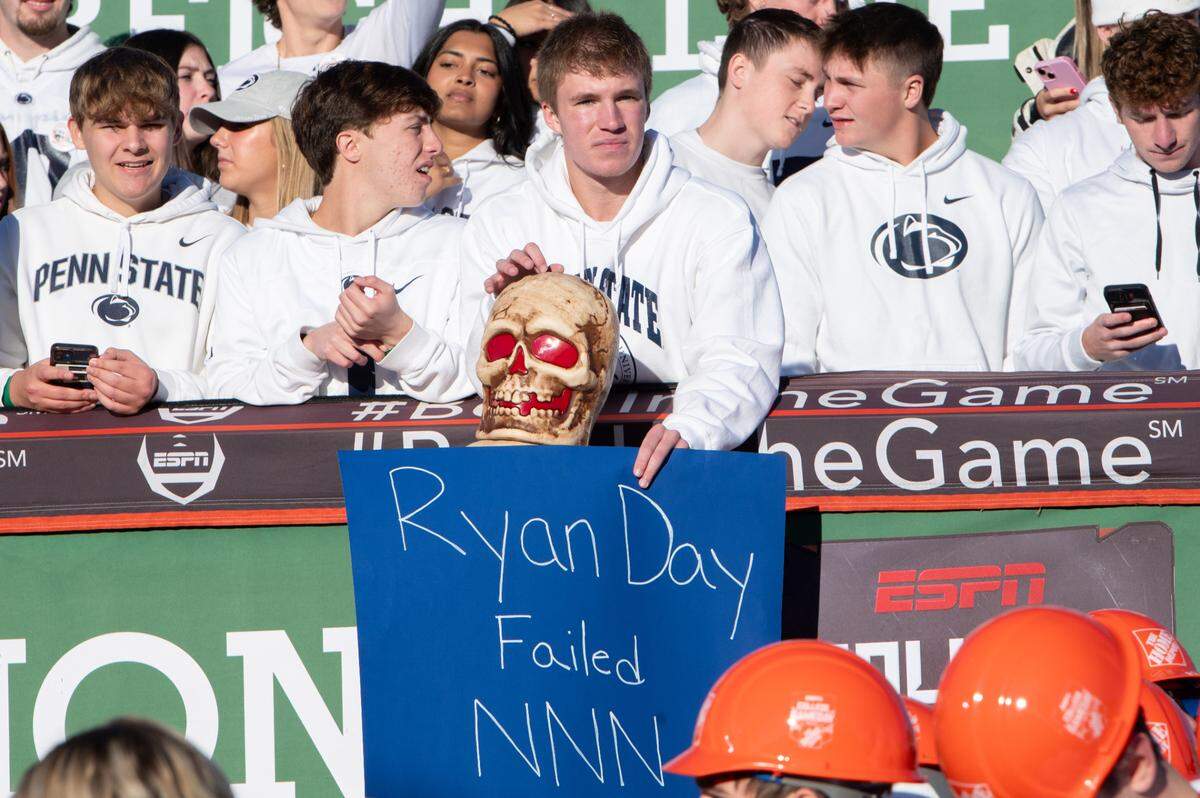 Penn State fans hold up signs on the set of ESPN College GameDay before the game against Ohio State at Beaver Stadium on Saturday, Nov. 2, 2024.