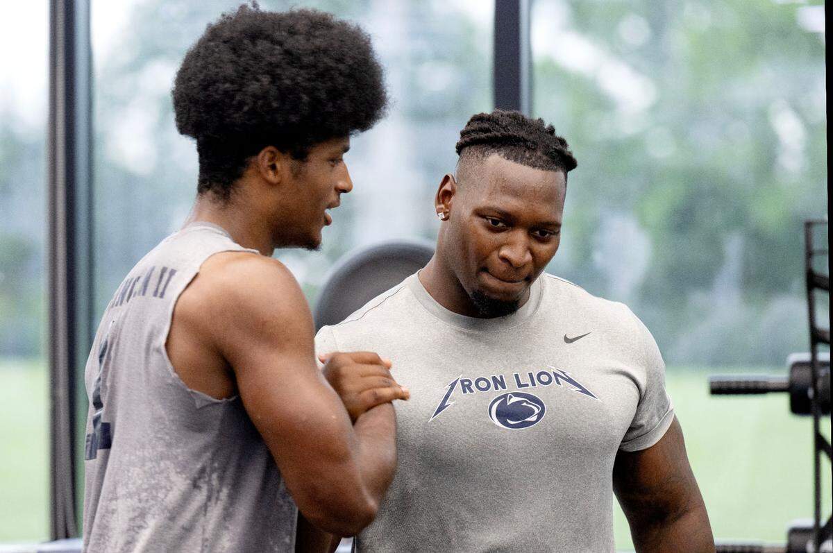 Penn State’s Lavar Arrington II greets Zane Durant during a summer strength session on Monday, July 14, 2025 in the Lasch Building.