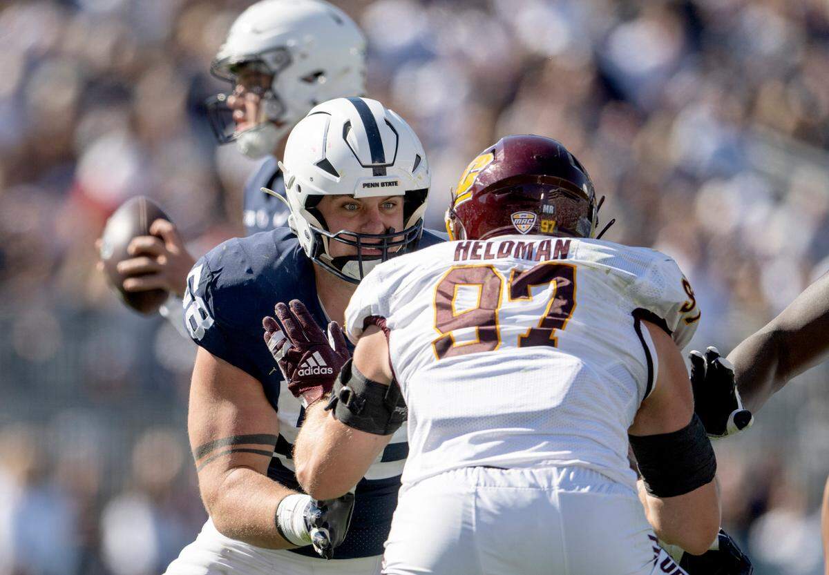 Penn State offensive lineman Landon Tengwall blocks Central Michigan’s Michael Heldman during the game on Saturday, Sept. 24, 2022.