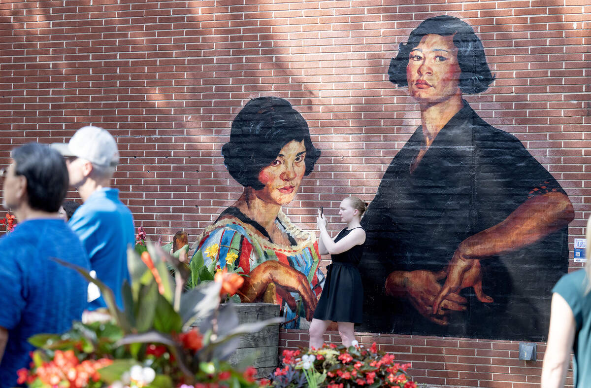 A large-scale replica of the painting “Two Sisters” by John Sloan on display at 101 Hiester Street as part of the “Looking at US: Celebrating America’s 250th” installation.