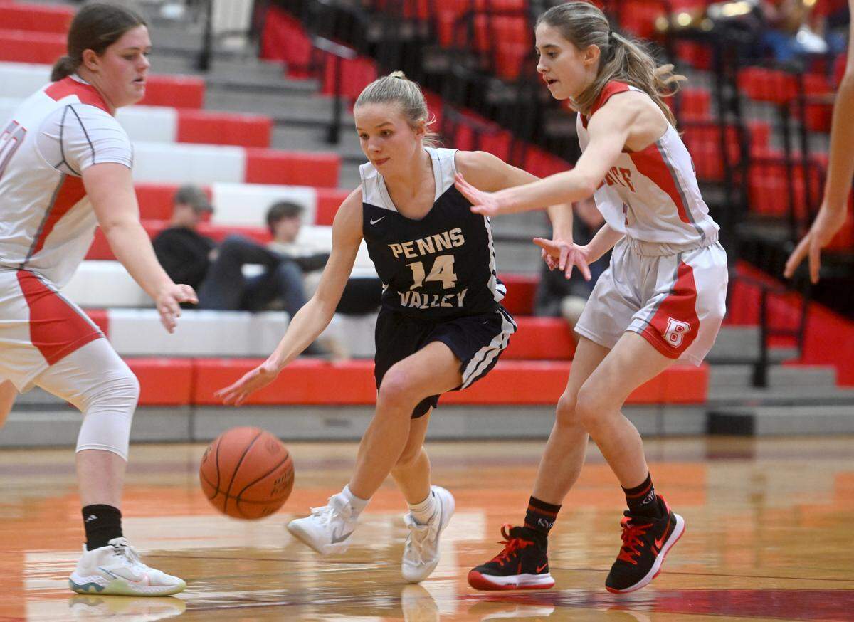 Penns Valley’s Scotty Dinges dribbles around Bellefonte defenders as she heads to the basket during the game on Monday, Jan. 23, 2023.
