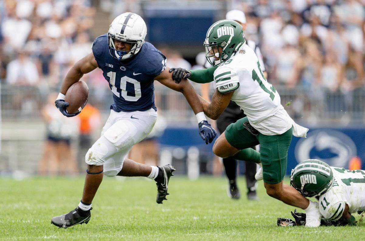 Ohio defenders can’t stop Penn State running back Nick Singleton during the game on Saturday, Sept. 10, 2022.