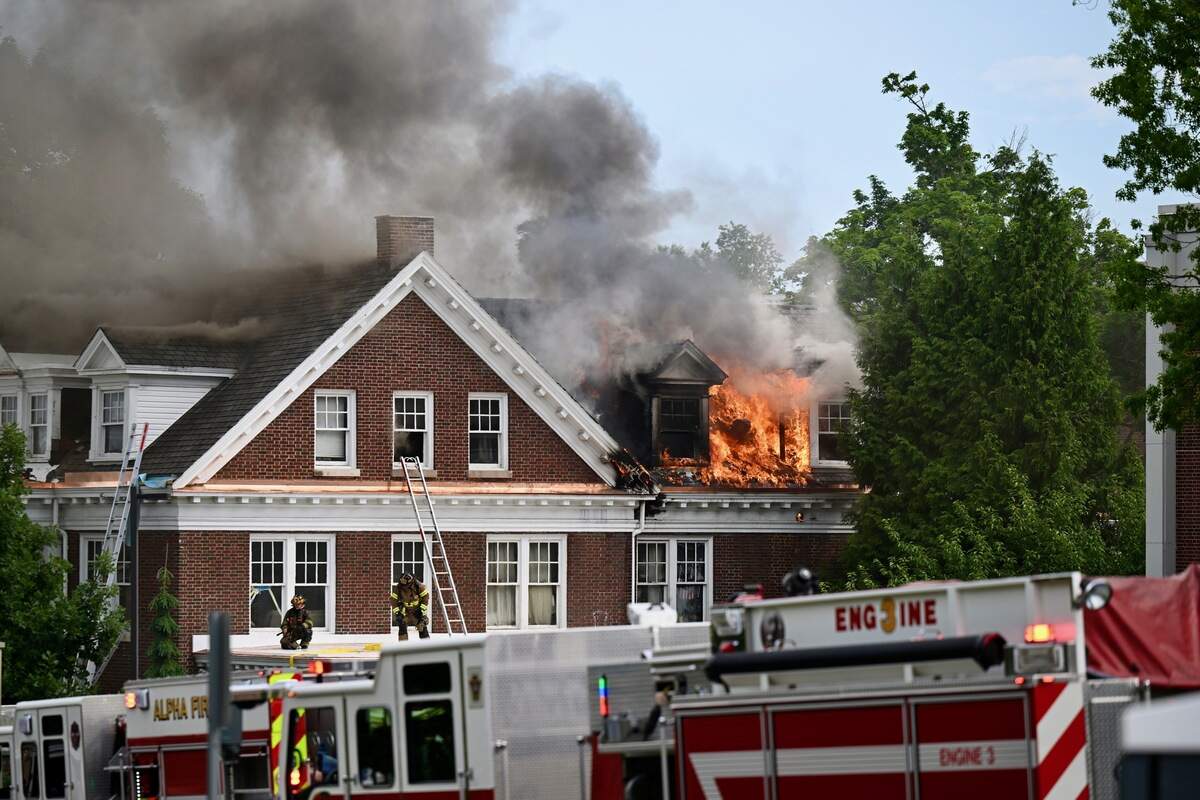 Crews respond to a fire in the Alpha Zeta fraternity house on North Burrowes Road on Penn State’s campus on Thursday, July 9, 2026.
