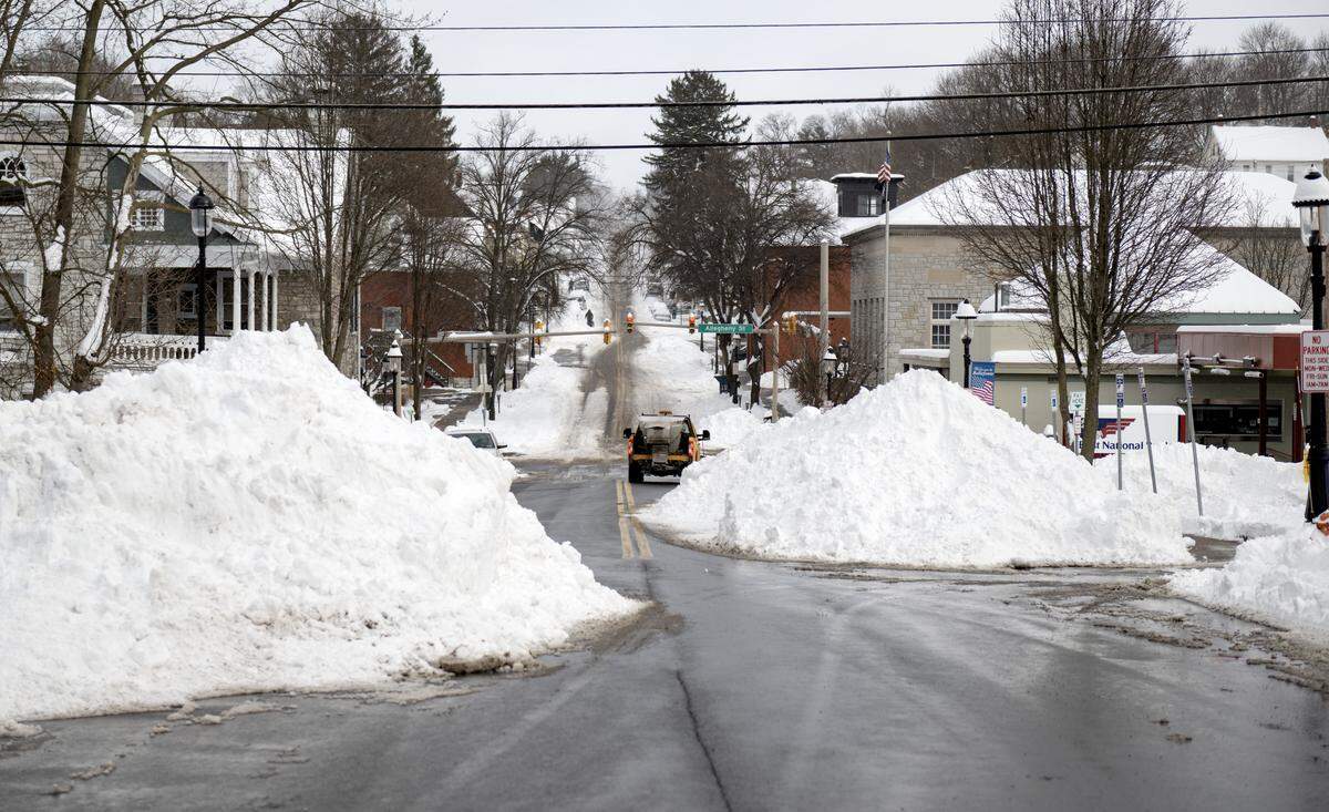 Snow piles on West Howard Street in Bellefonte on Monday, Jan. 26, 2026.  
