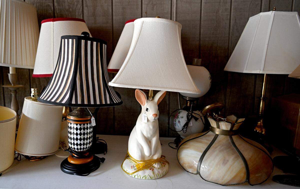 A variety of lamps and lighting features for sale at the Foxdale Village semi-annual garage sale.