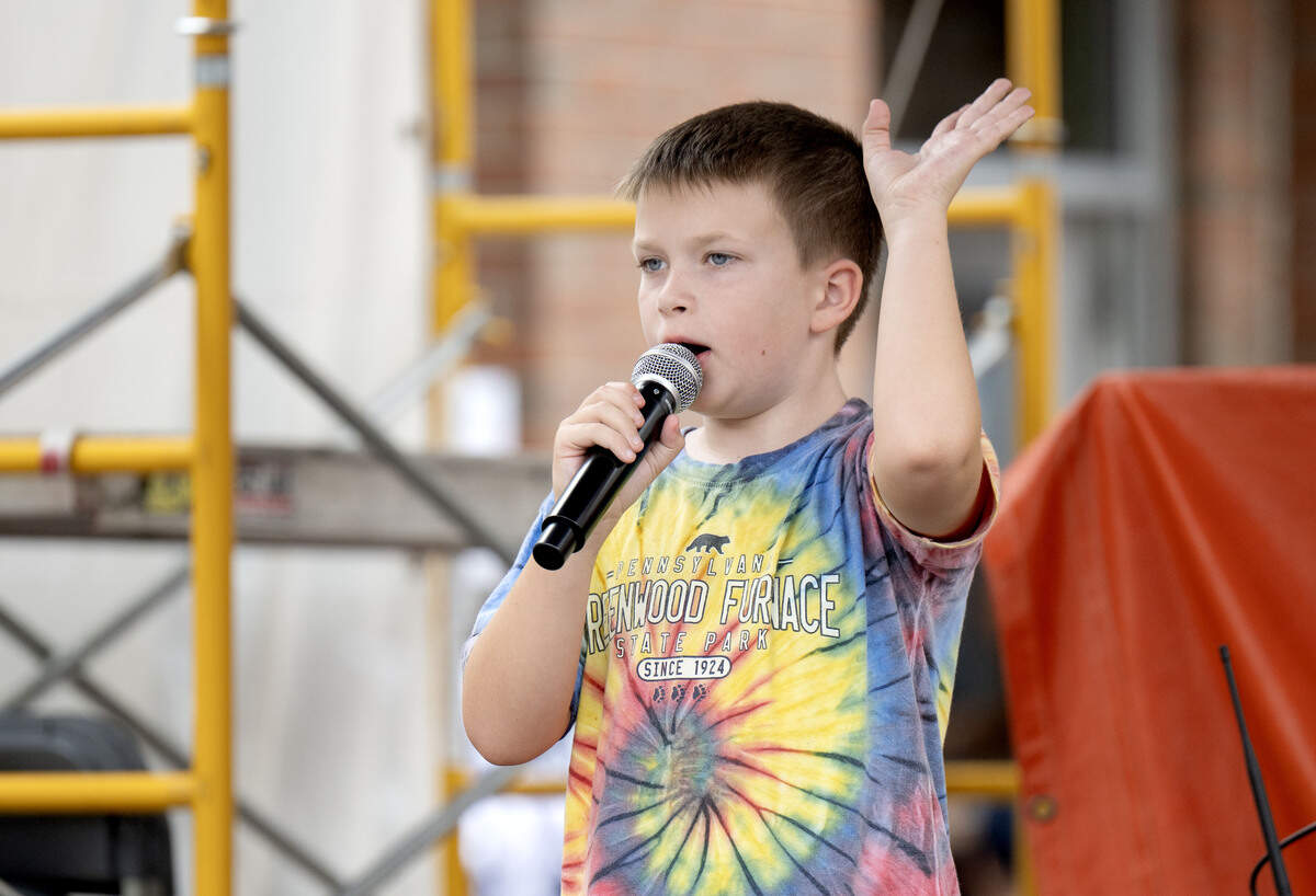 Merritt Reed, 8, sings karaoke to “I’m Gonna Be (500 Miles)” during the Children and Youth Day at the Central Pennsylvania Festival of the Arts on Wednesday, July 8, 2026.