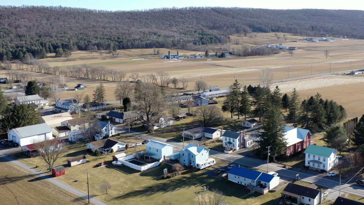 An aerial view of the village of Madisonburg, which only has one fixed wireless internet service provider and experiences internet speeds well below the federal definition of broadband.