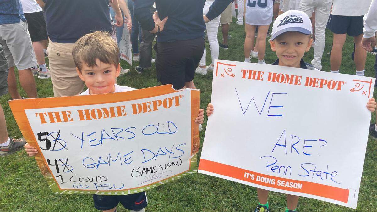 Young Penn State fans show up early with their signs read for ESPN’s “College GameDay” live from Old Main on Penn State’s campus on Saturday, Sept. 18, 2021.