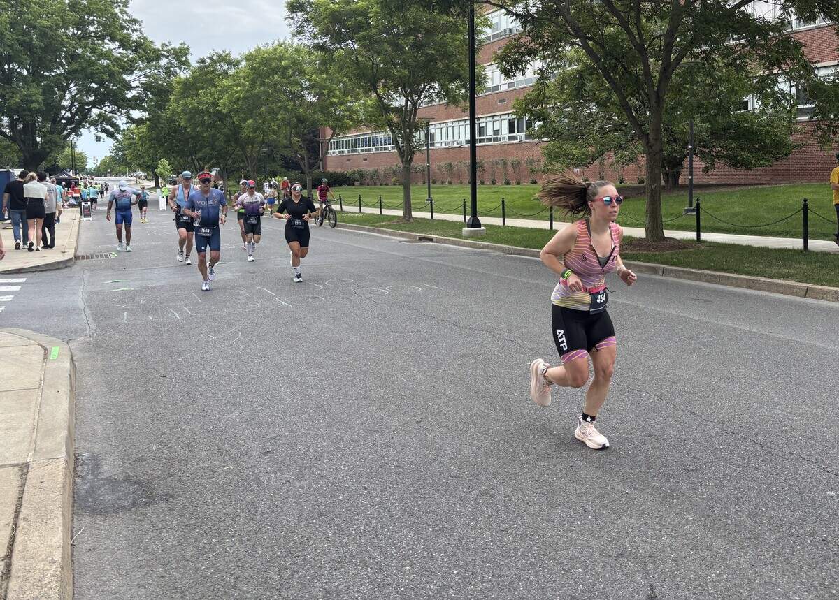 Runners near the course’s end on Curtin Road on Penn State’s campus on Sunday, June 14, 2026, at the Ironman 70.3 Pennsylvania Happy Valley North American Championship in Centre and Clinton counties.