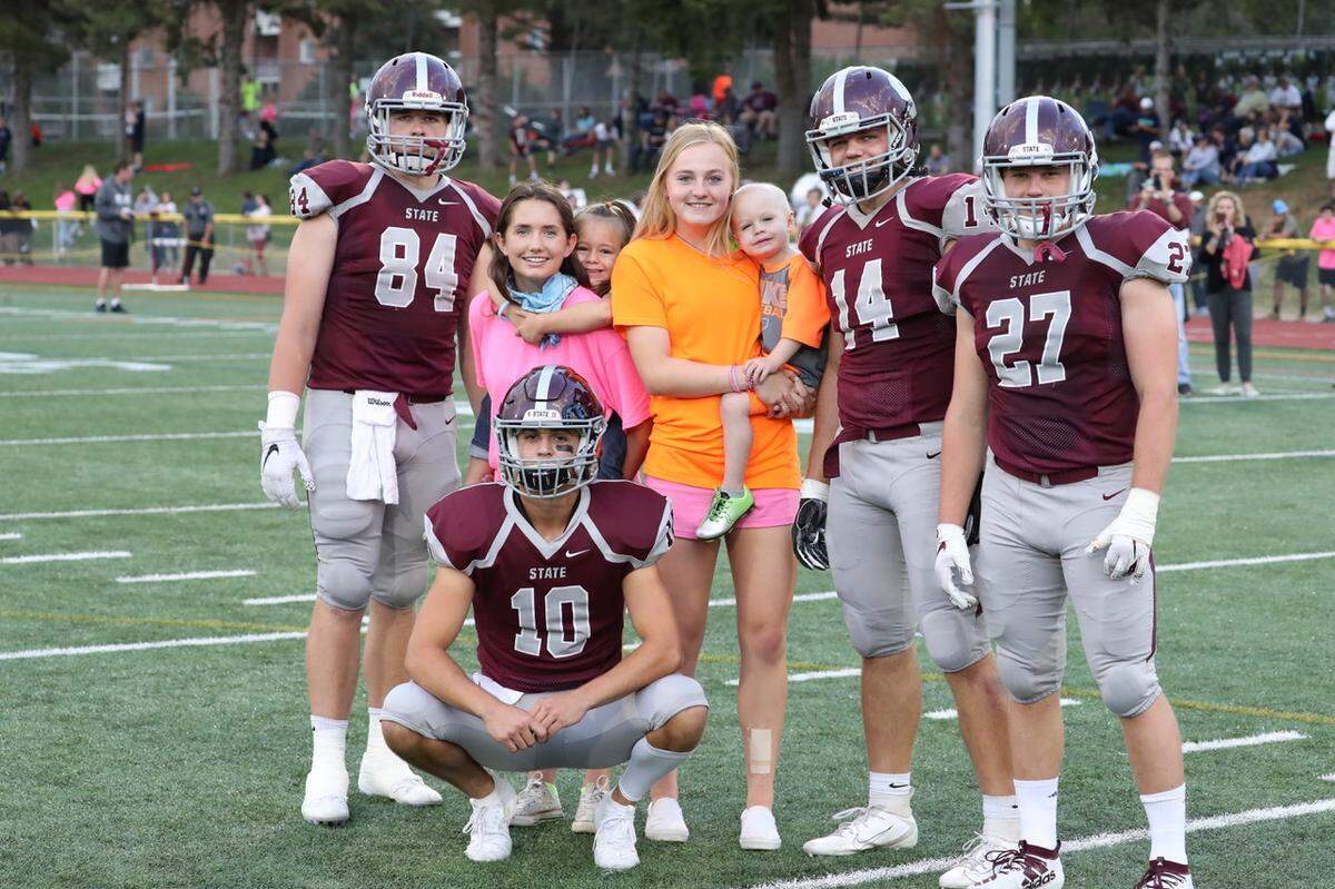 The State College girls’ soccer team has taken Jack Sylves, a local 4-year-old fighting cancer, and his sister Marlowe under its wing this season. Jack and Marlowe are pictured here with State High soccer and football players during a special football game dedicated to Jack in September.
