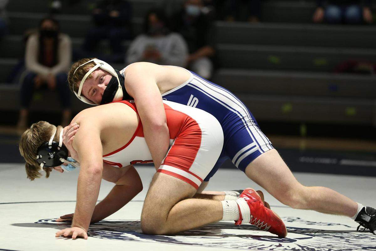 Penns Valley’s Ben Sharer holds down Bellefonte’s Addison Shawley in their 285-pound match on Thursday. Shawley rallied to pin Sharer in 5:52 as the Red Raiders won 43-15.