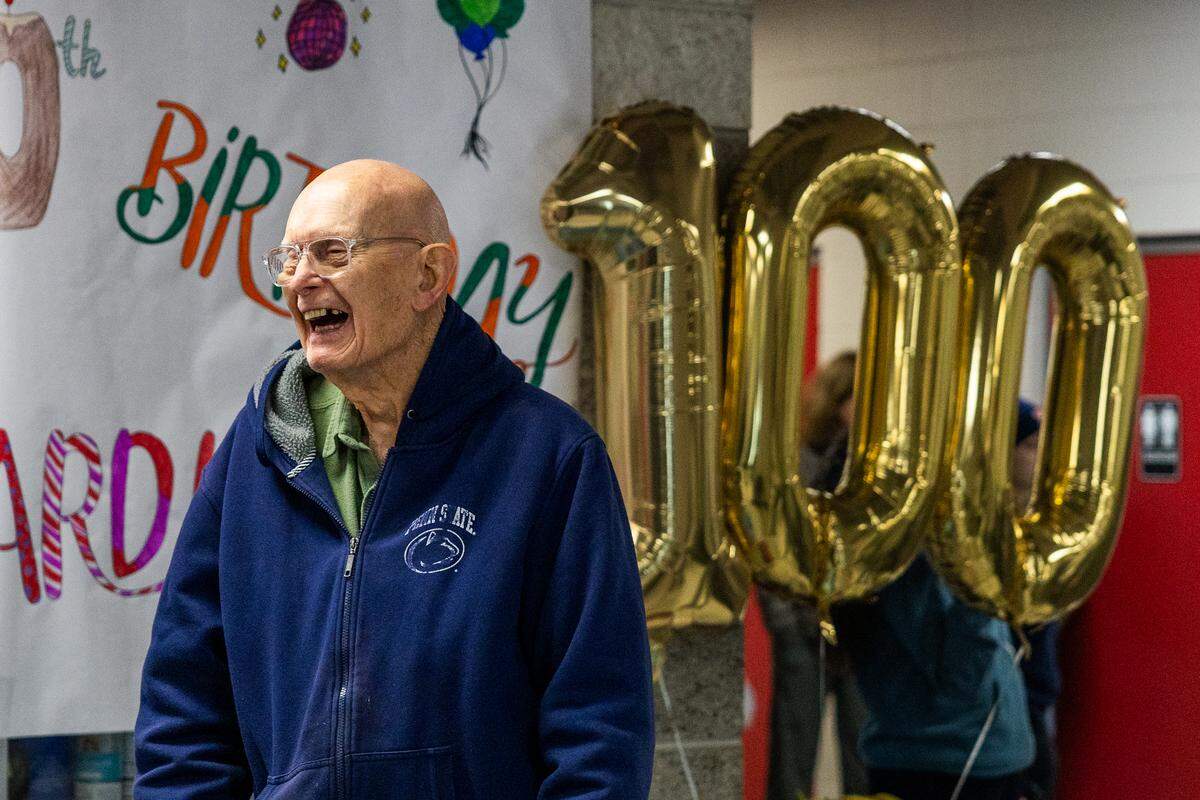 Maynard Kohler, a daily swimmer at the YMCA in State College, laughs during his 100th birthday party on Friday, Jan. 23, 2026 in State College. Kohler has been swimming at the YMCA for 22 years.