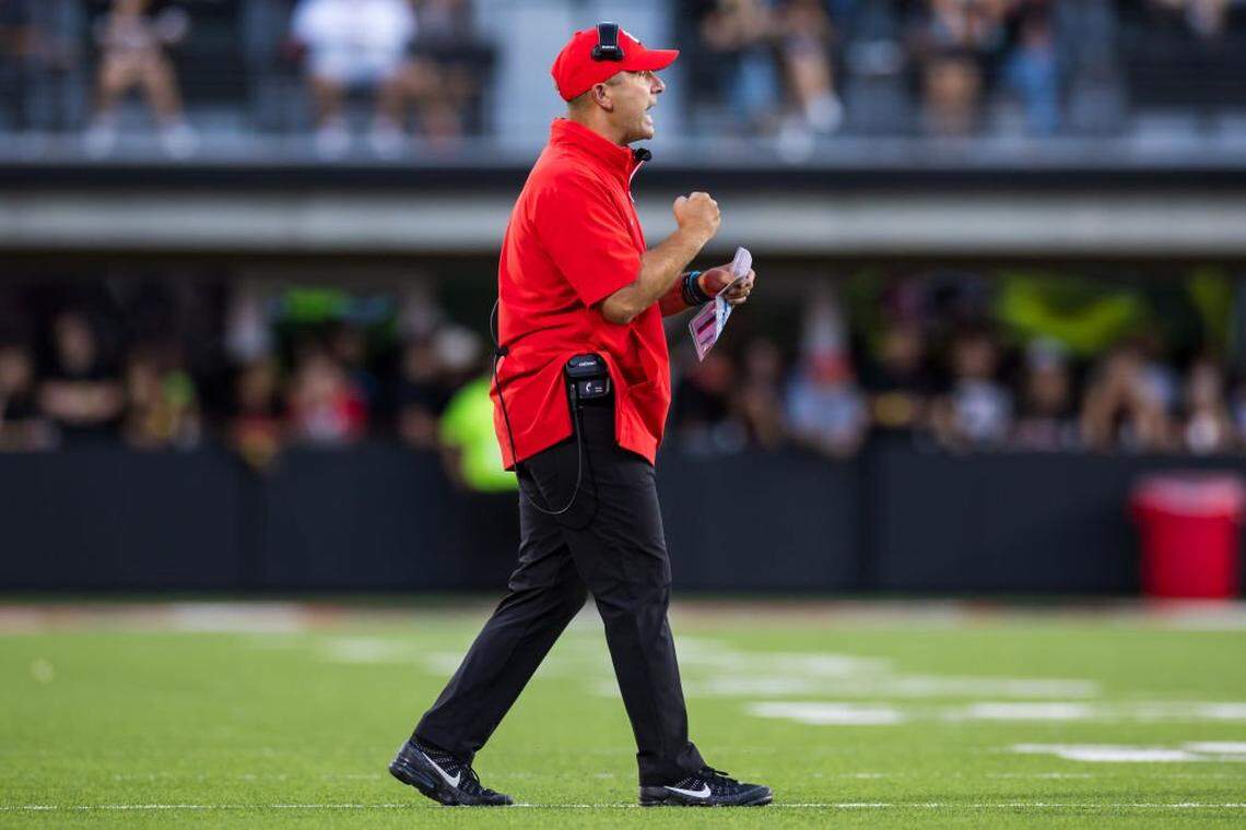 LUBBOCK, TEXAS - SEPTEMBER 28: Defensive coordinator Tyson Veidt of the Cincinnati Bearcats signals during the first half of the game against the Texas Tech Red Raiders at Jones AT&T Stadium on September 28, 2024 in Lubbock, Texas. (Photo by John E. Moore III/Getty Images)