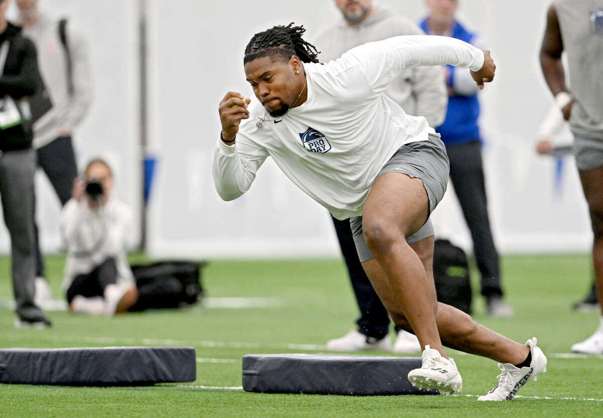 Offensive lineman Camden Wallace runs position drills for NFL Scouts at Penn State’s Pro Day on Friday, March 15, 2024 in Holuba Hall.