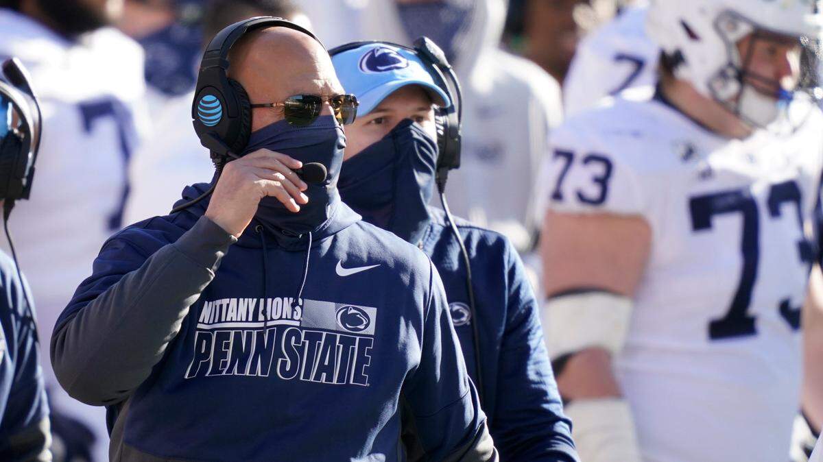 Penn State head coach James Franklin watches from the sideline during the second half of an NCAA college football game against Michigan, Saturday, Nov. 28, 2020, in Ann Arbor, Mich. (AP Photo/Carlos Osorio)