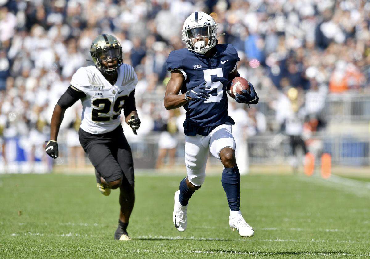 Penn State wide receiver Jahan Dotson makes a catch and outruns Purdue defenders for a touchdown during the game on Saturday Oct. 5, 2019.