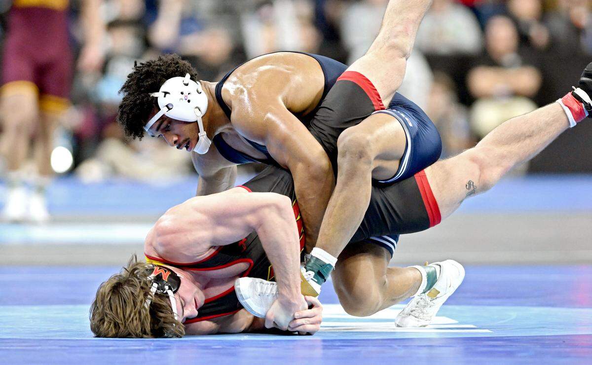 Penn State’s Carter Starocci controls Maryland’s Jaxon Smith in a 184-pound quarterfinal bout during the 2025 NCAA Wrestling Championships in Philadelphia on Friday, March 21, 2025.
