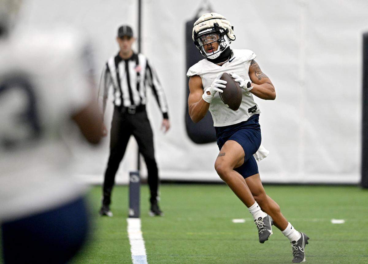 Penn State wide receiver Omari Evans makes a catch during spring practice on Tuesday, March 14, 2023.