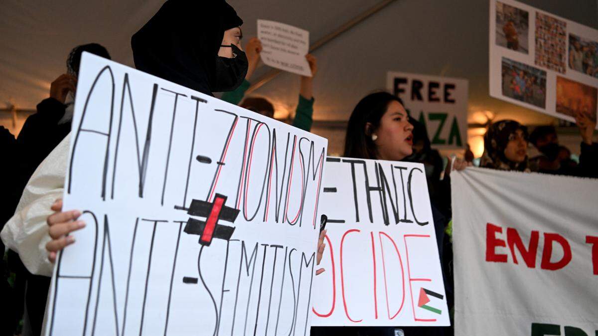 Penn State students and community members gather to show support for Palestine at the Allen Street gates on Thursday, Oct. 12, 2023.