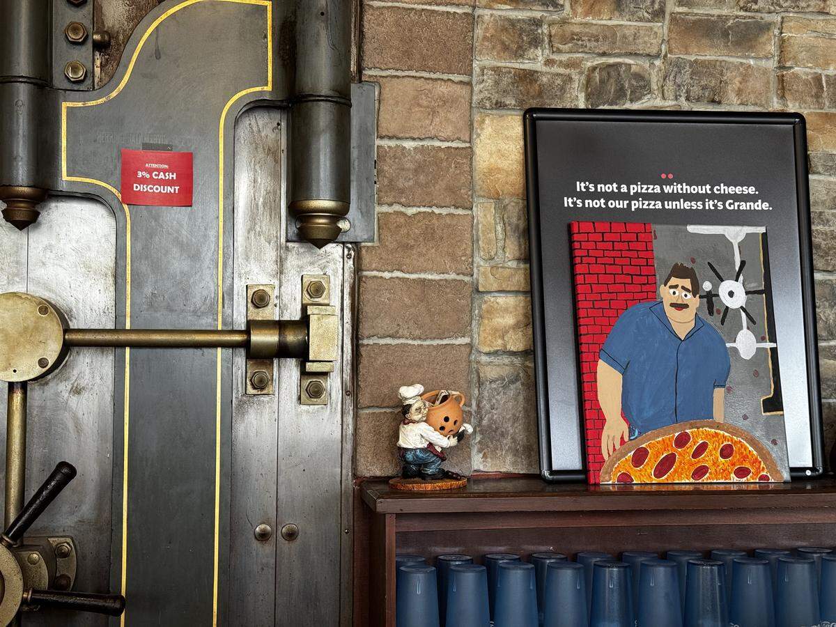 A painting depicting Yancy Sagastume rests in Brothers Pizza of Howard on May 22, 2026. Sagastume owns the shop.
