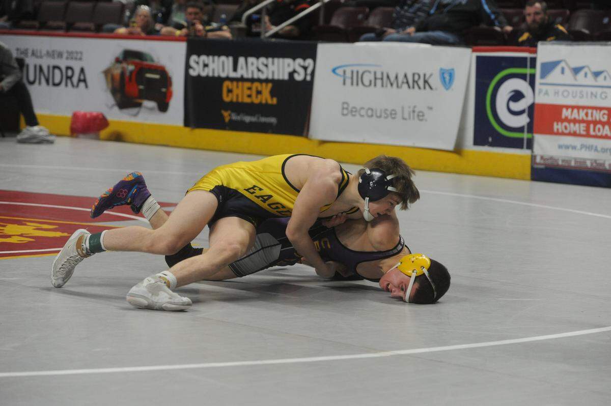 Bald Eagle Area’s Coen Bainey controls Lancaster Catholic’s Eric Howe in their 120-pound second round match of the PIAA Class 2A Championships on Thursday, March 10, 2022 at Giant Center in Hershey. Bainey beat Howe 7-2.