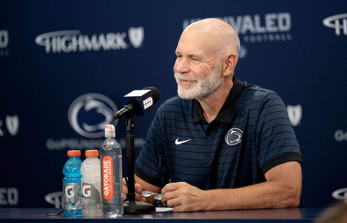 Penn State defensive coordinator Jim Knowles smiles as he is asked questions during media day on Saturday, Aug. 2, 2025.  