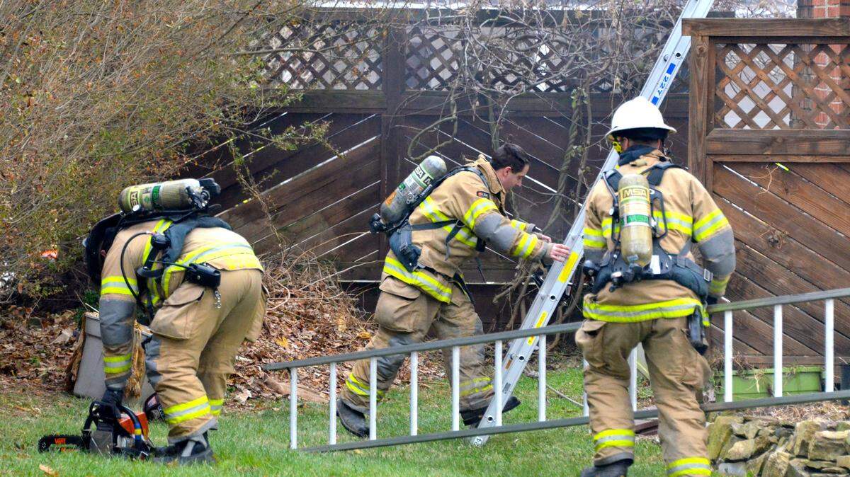 Firefighters battle a blaze at 209 S. Pennsylvania Ave. in Centre Hall Saturday morning.