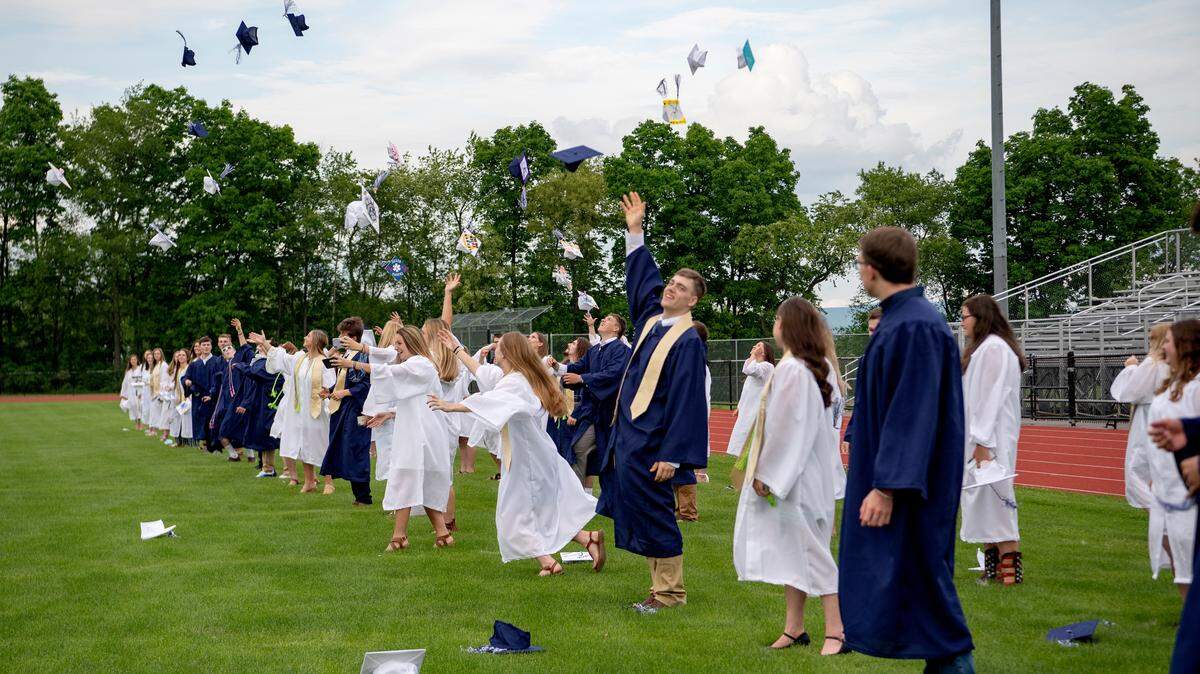 The Penns Valley Class of 2020 tosses their caps at the end of a ceremony on June, 5, 2020.